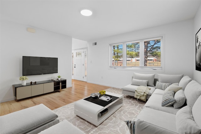 250 Blauvelt Rd, Pearl River, NY 10965 - living area with visible vents, light wood finished floors, and baseboards