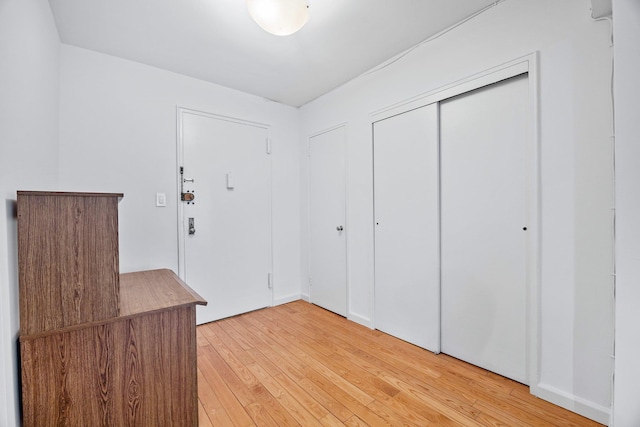 entrance foyer with light wood finished floors