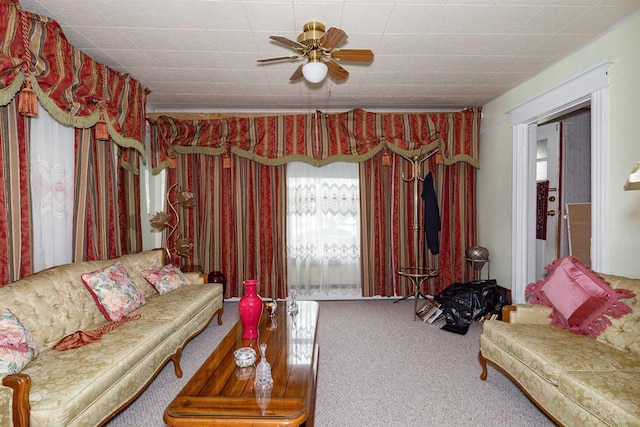 living room with ceiling fan and carpet flooring