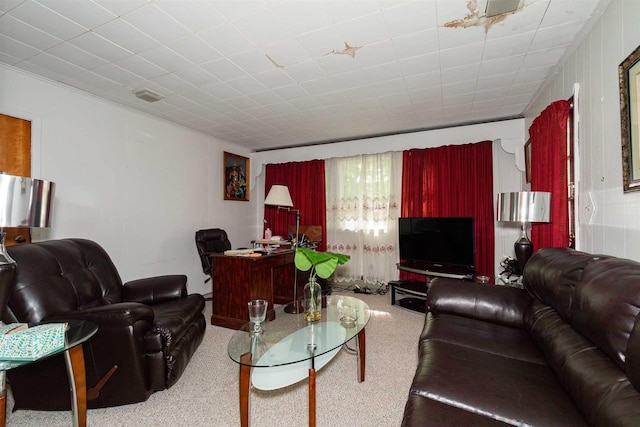 living room featuring visible vents and carpet floors