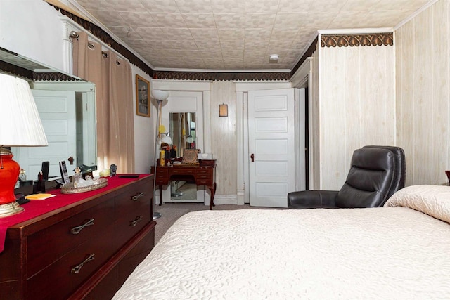 carpeted bedroom with crown molding