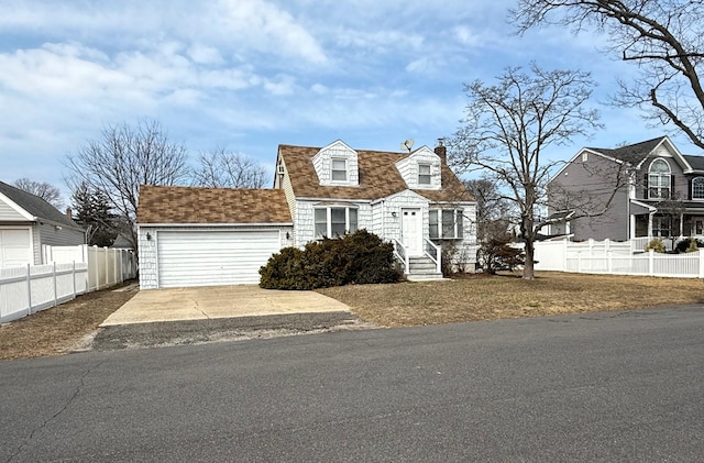 view of front of house with entry steps, fence, roof with shingles, an attached garage, and a chimney