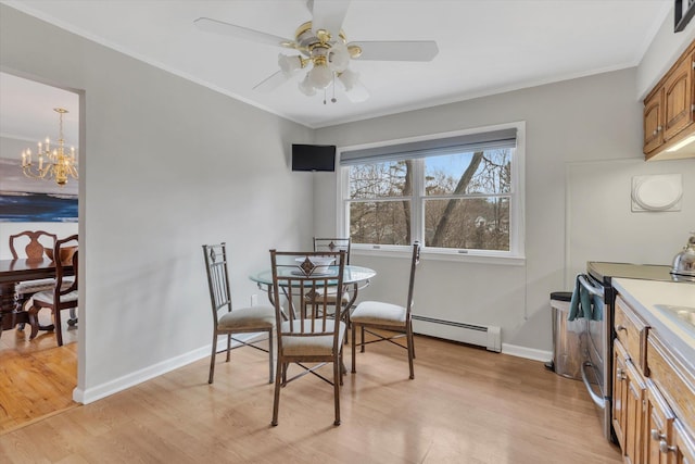 dining space featuring baseboards, light wood finished floors, a baseboard radiator, ornamental molding, and ceiling fan with notable chandelier