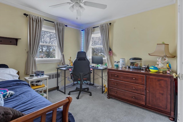 carpeted bedroom with a ceiling fan, ornamental molding, and radiator heating unit