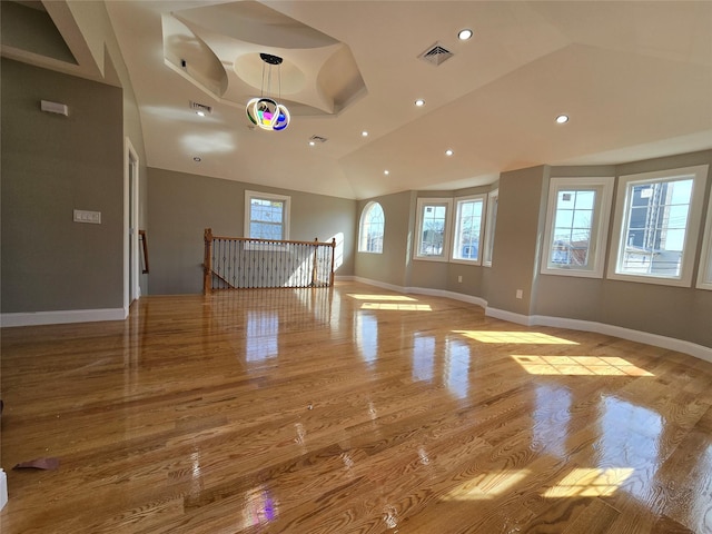 unfurnished room featuring recessed lighting, visible vents, baseboards, and wood finished floors