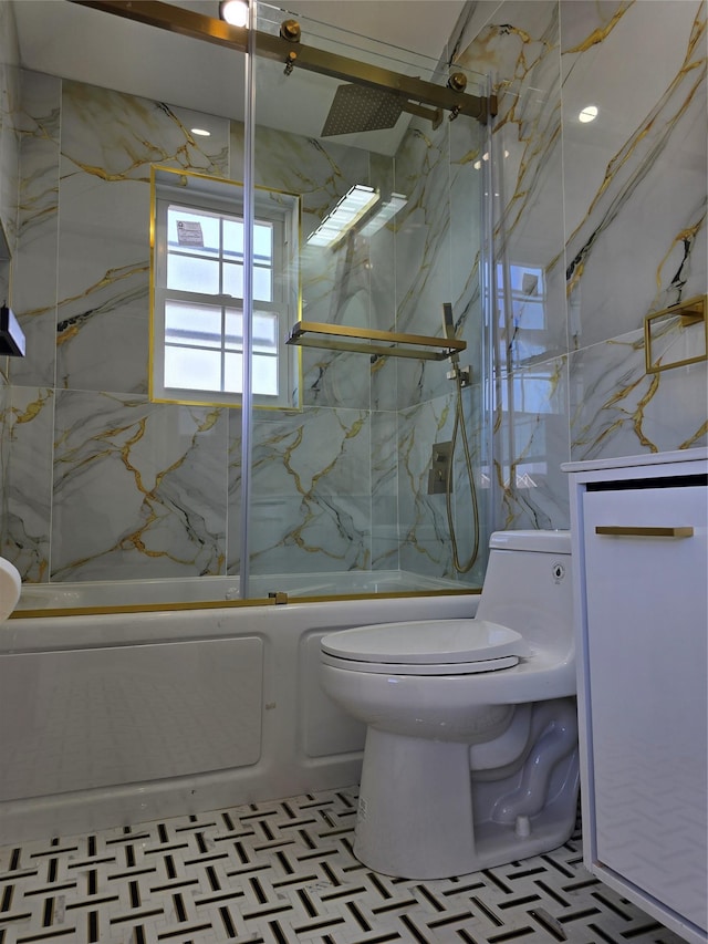 full bathroom with enclosed tub / shower combo and toilet