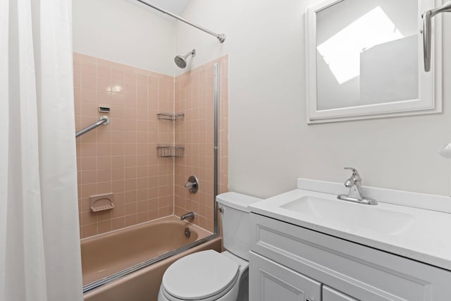 full bath featuring vanity, toilet, and bathing tub / shower combination