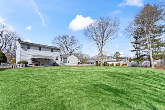 view of yard with fence