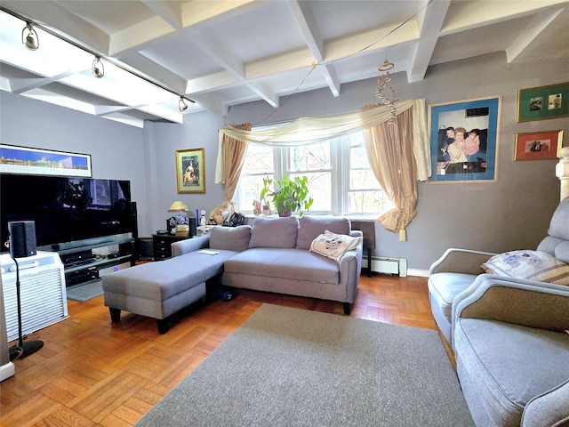 living room featuring beam ceiling, coffered ceiling, baseboards, and a baseboard radiator