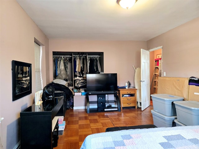 bedroom featuring baseboards