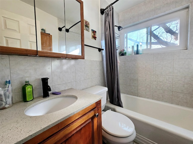 full bathroom with shower / bath combo with shower curtain, toilet, tasteful backsplash, tile walls, and vanity