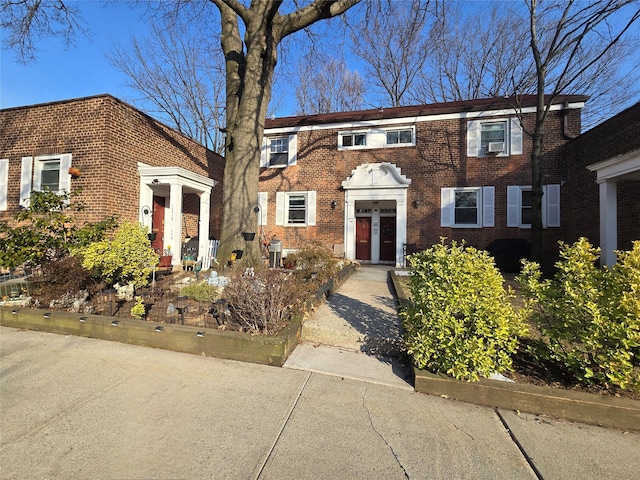 view of front of home with brick siding