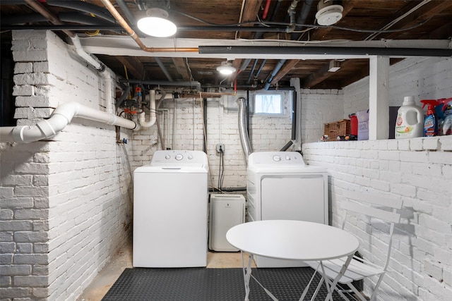 laundry room featuring washer and dryer and laundry area