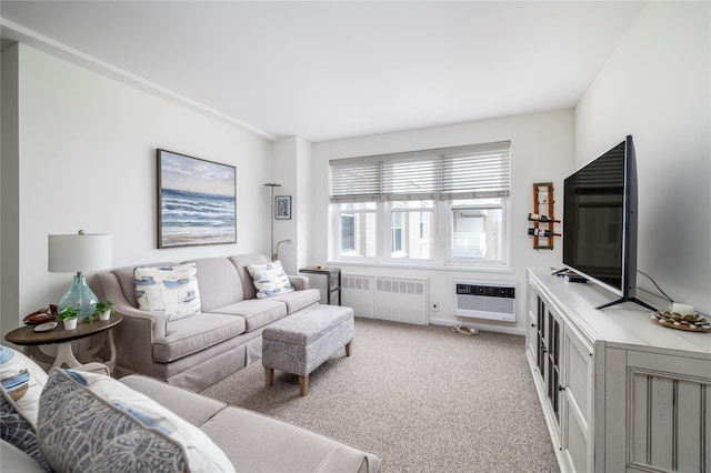 living room with an AC wall unit, radiator, baseboards, and light carpet