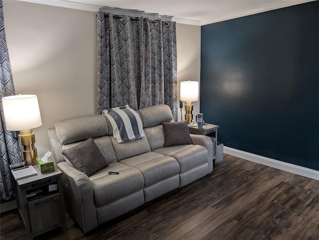 living area with baseboards, dark wood finished floors, and crown molding