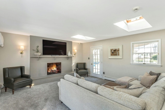 carpeted living area featuring a baseboard radiator and a warm lit fireplace