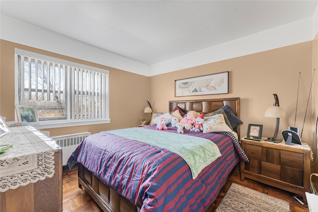 bedroom with radiator heating unit