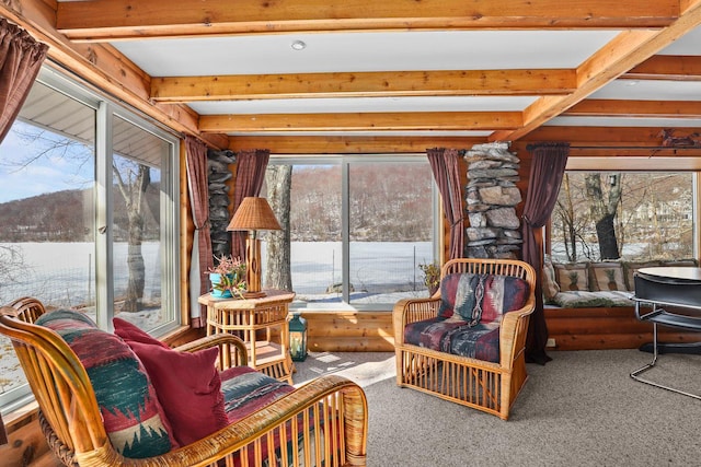 sunroom / solarium with beamed ceiling