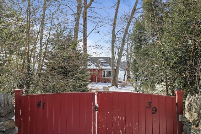 view of gate featuring fence