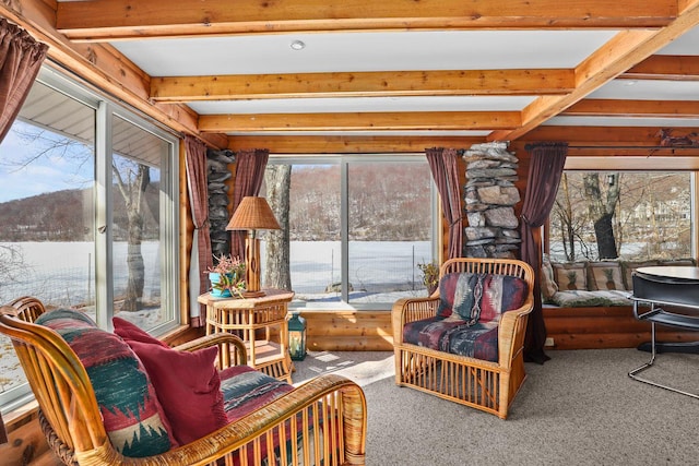 sunroom / solarium with beam ceiling