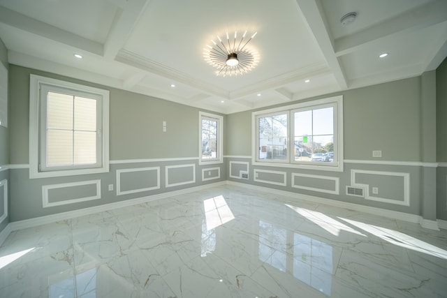 empty room featuring visible vents, beam ceiling, marble finish floor, and a decorative wall