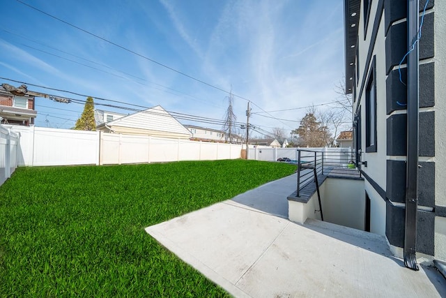 view of yard with a patio and fence