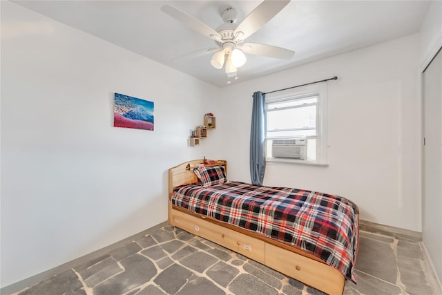 carpeted bedroom featuring a closet, cooling unit, and a ceiling fan