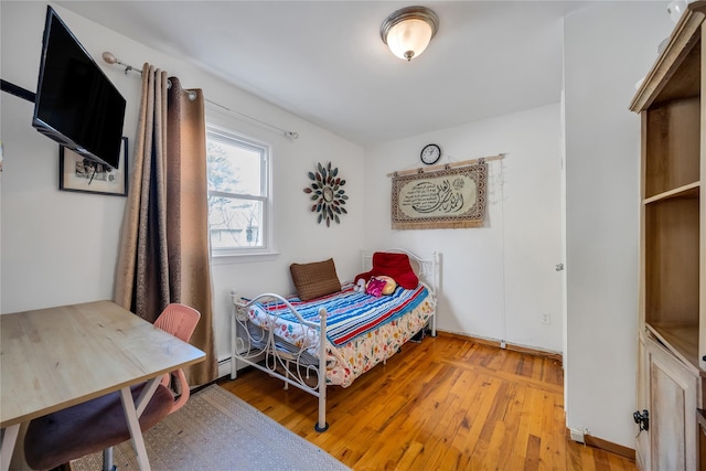 bedroom with light wood-style flooring