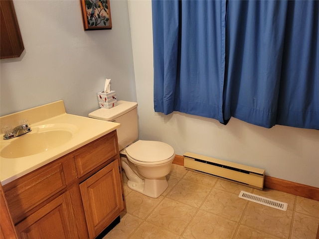 half bathroom with visible vents, toilet, tile patterned floors, vanity, and a baseboard radiator