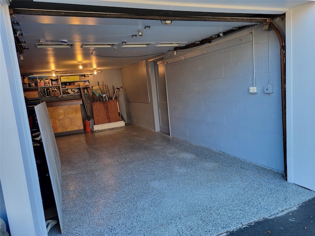 finished basement with concrete block wall