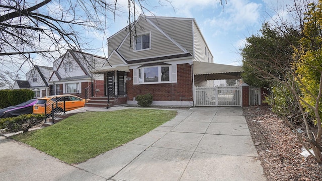 bungalow-style house featuring driveway, a front lawn, a gate, a carport, and brick siding