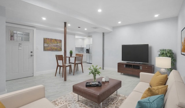 living room featuring recessed lighting, visible vents, baseboards, and marble finish floor