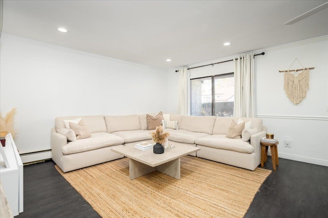 living room with recessed lighting, a baseboard heating unit, wood finished floors, and ornamental molding