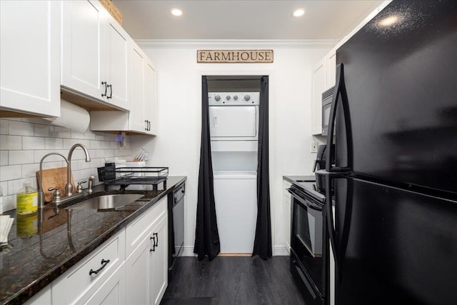 kitchen with dark wood-type flooring, black appliances, a sink, white cabinetry, and crown molding