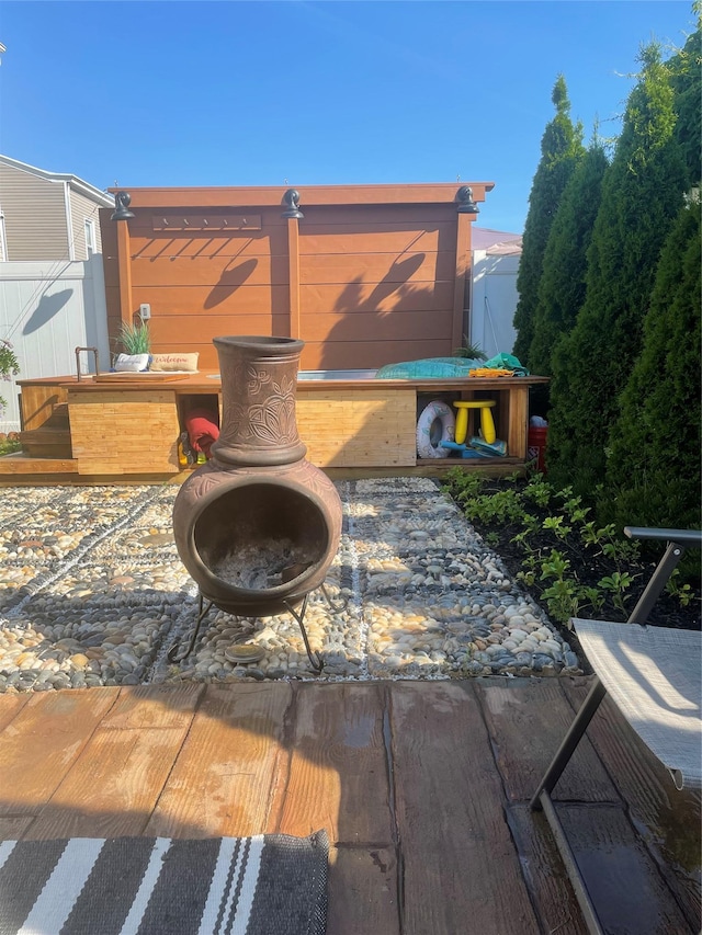 10719 96th St, Ozone Park, NY 11417 - view of patio / terrace with an outdoor fire pit