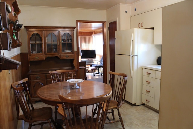 dining room featuring light tile patterned floors