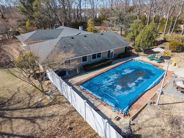 view of pool with a patio area, a fenced backyard, and a fenced in pool