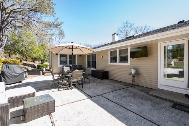 view of patio / terrace with grilling area and outdoor dining space