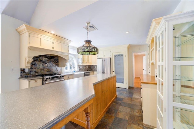69 Leber Rd, Blauvelt, NY 10913 - kitchen featuring appliances with stainless steel finishes, decorative backsplash, french doors, and visible vents