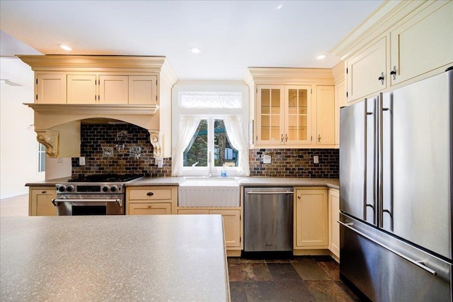 69 Leber Rd, Blauvelt, NY 10913 - kitchen featuring a sink, tasteful backsplash, stainless steel appliances, and cream cabinetry