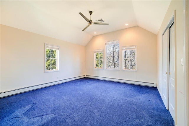 69 Leber Rd, Blauvelt, NY 10913 - unfurnished bedroom featuring visible vents, dark carpet, recessed lighting, a baseboard heating unit, and vaulted ceiling