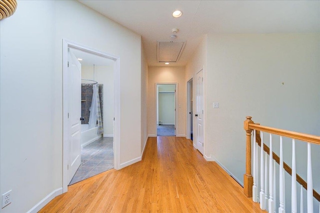 69 Leber Rd, Blauvelt, NY 10913 - hallway featuring light wood-style floors, attic access, baseboards, recessed lighting, and an upstairs landing