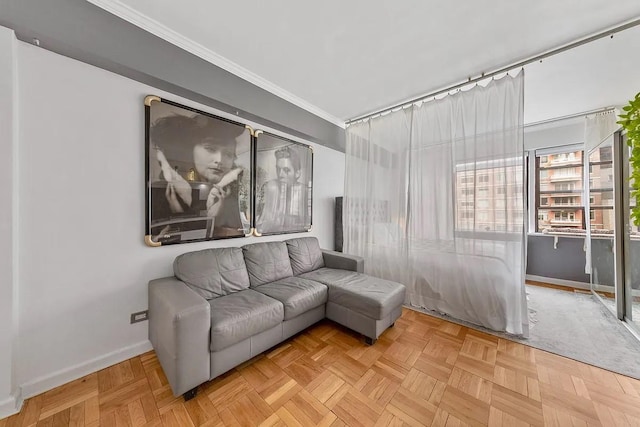 living room featuring baseboards and ornamental molding