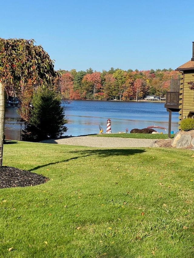 view of water feature featuring a wooded view