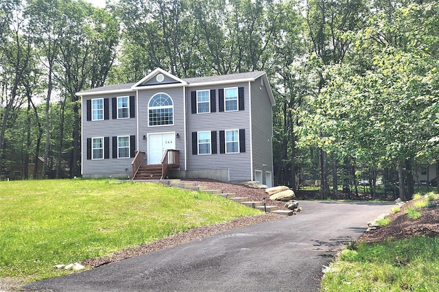 164 Lake Shore Dr E, Rock Hill, NY 12775 - colonial-style house with a front yard and asphalt driveway