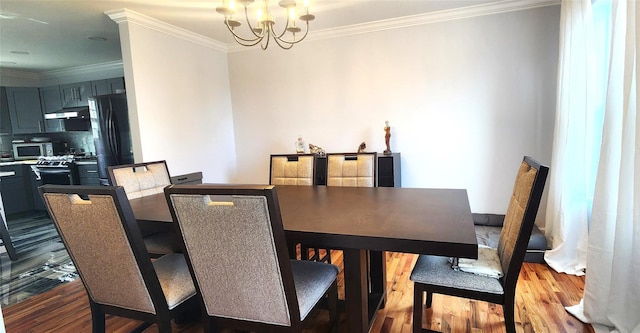 164 Lake Shore Dr E, Rock Hill, NY 12775 - dining room featuring wood finished floors, a chandelier, and ornamental molding