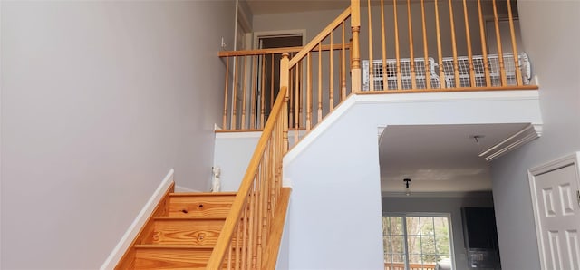 164 Lake Shore Dr E, Rock Hill, NY 12775 - stairs featuring ornamental molding and a towering ceiling