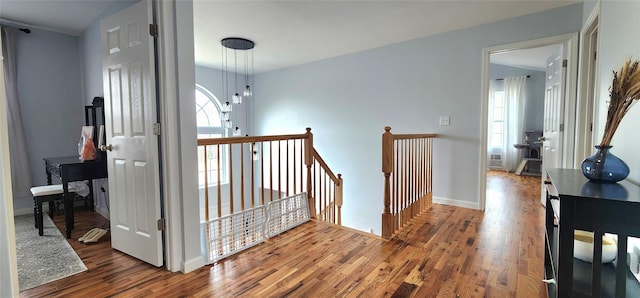 164 Lake Shore Dr E, Rock Hill, NY 12775 - corridor with an upstairs landing and wood finished floors