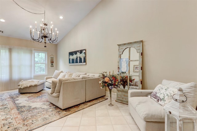 tiled living area featuring recessed lighting, high vaulted ceiling, and a chandelier