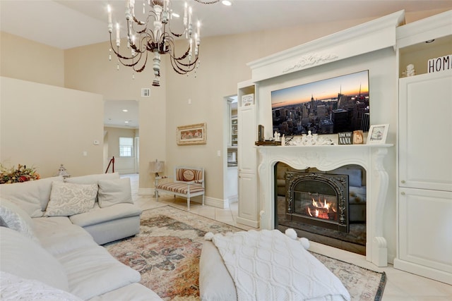 living area with light tile patterned floors, a notable chandelier, a fireplace, and visible vents